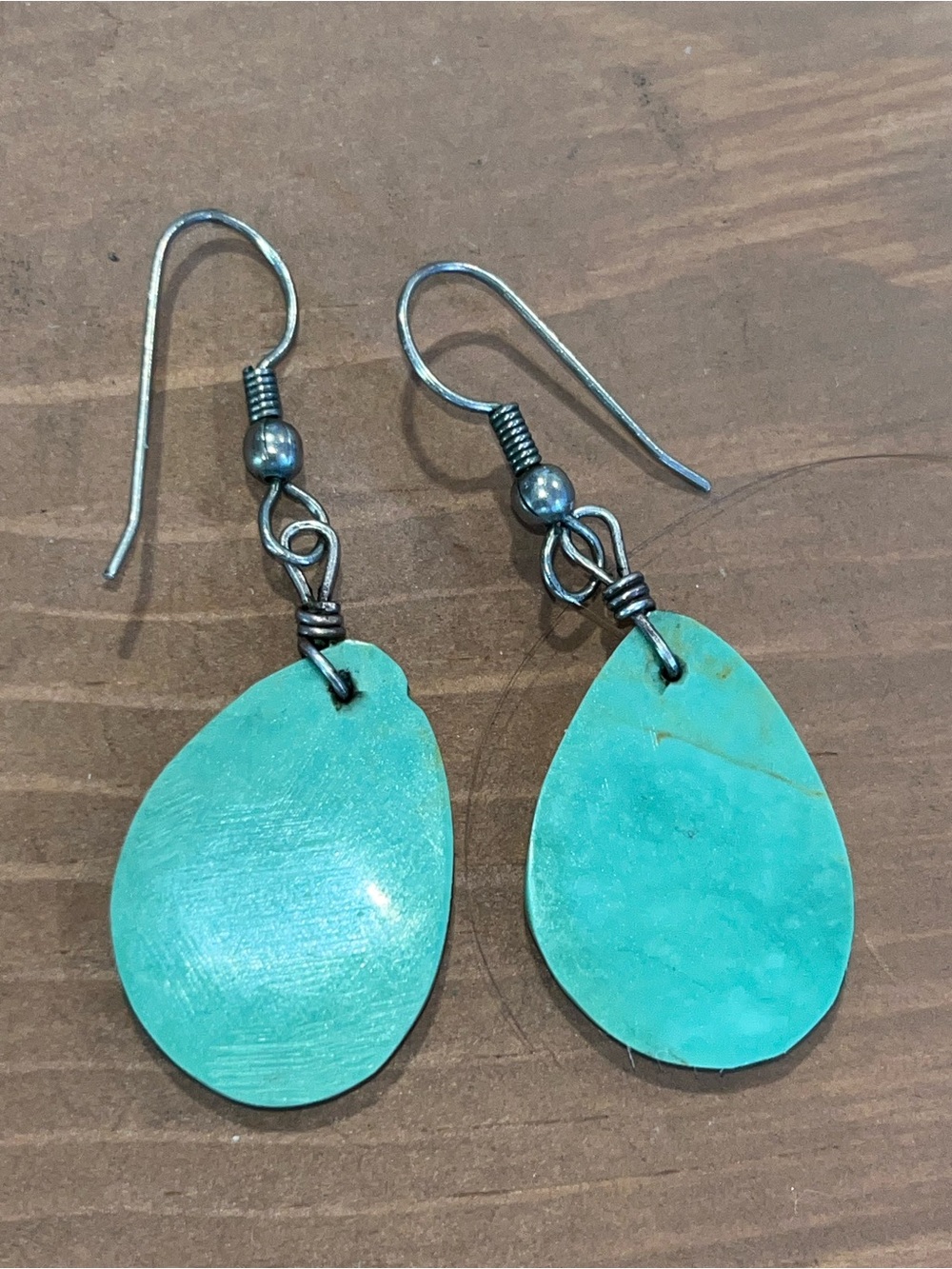 Turquoise handmade earrings with silver tone wire wrap and ear wire lightweight.